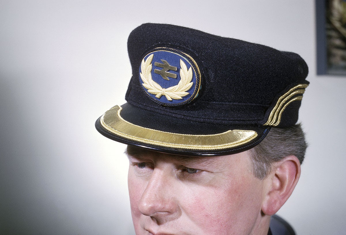 British Rail employee wearing cap with company badge, April 1964.