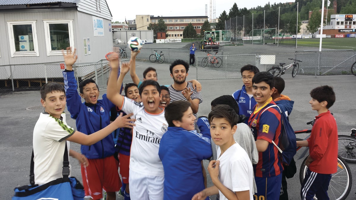 Copa90 presenter Eli Mengem is mobbed by excited kids in Norway. Photo by Lawrence Tallis for Copa90