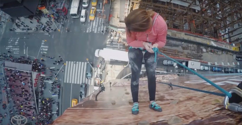 Toyota Hybrid climbing wall ad in Times Square