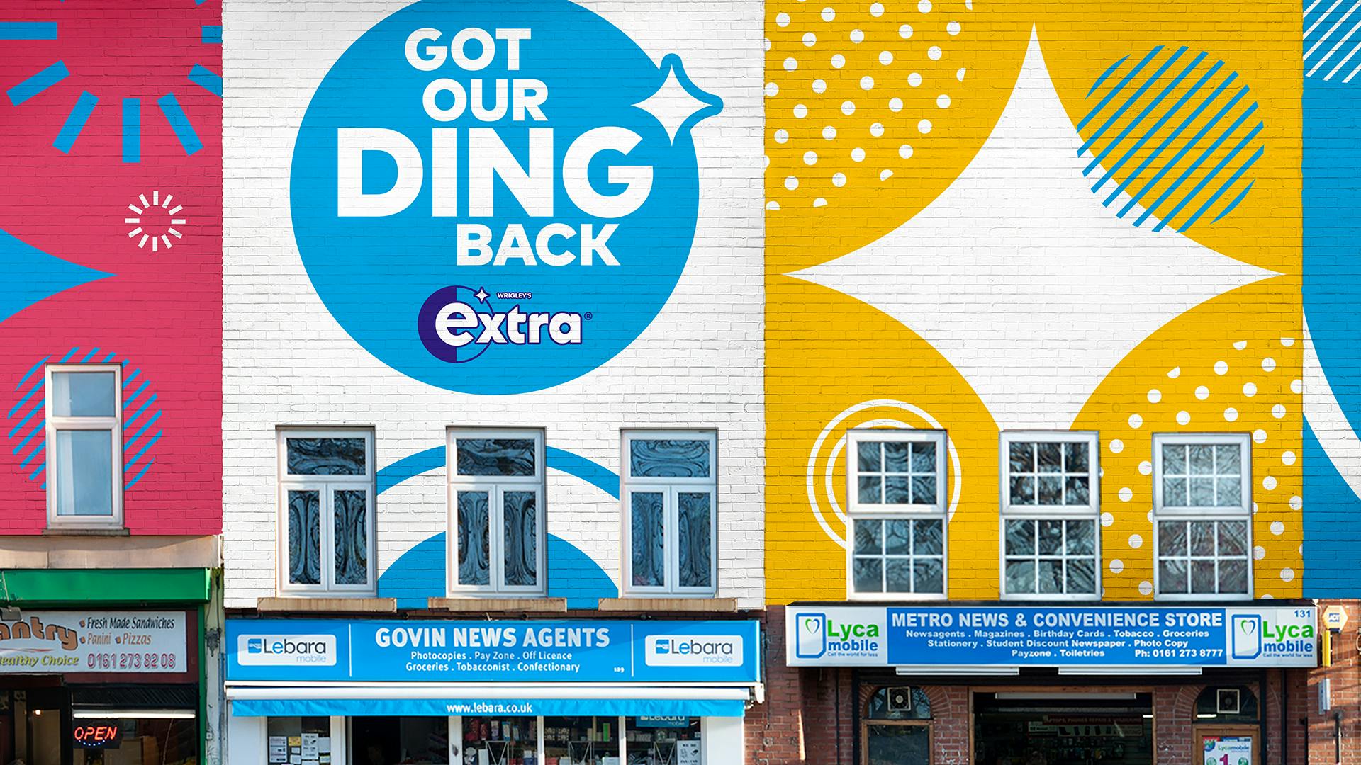 Photo of an Extra chewing gum mural that reads 'Got Our Ding Back'