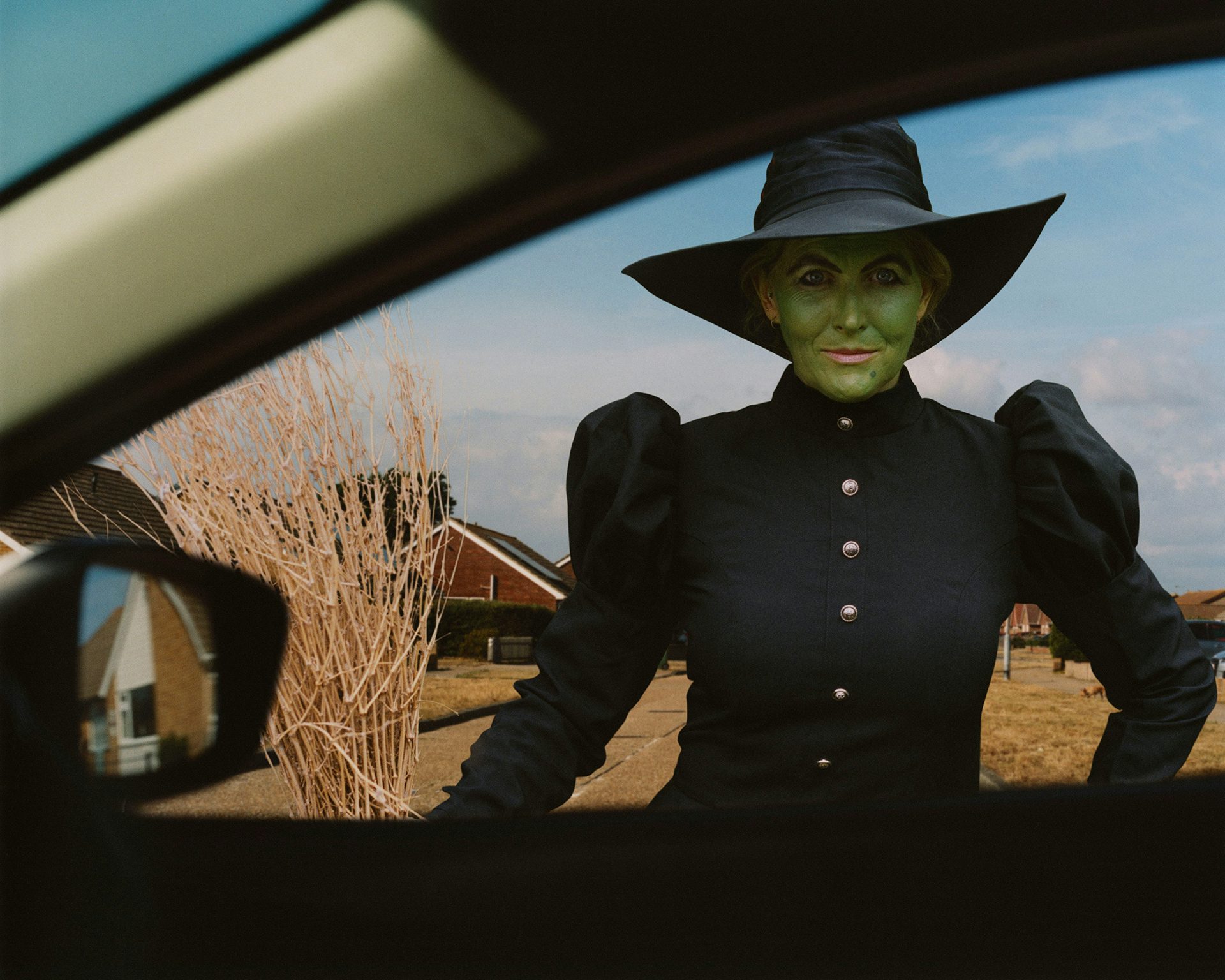 Photograph of a cosplayer as Wicked Witch of the West in Kids of Cosplay by Thurstan Redding