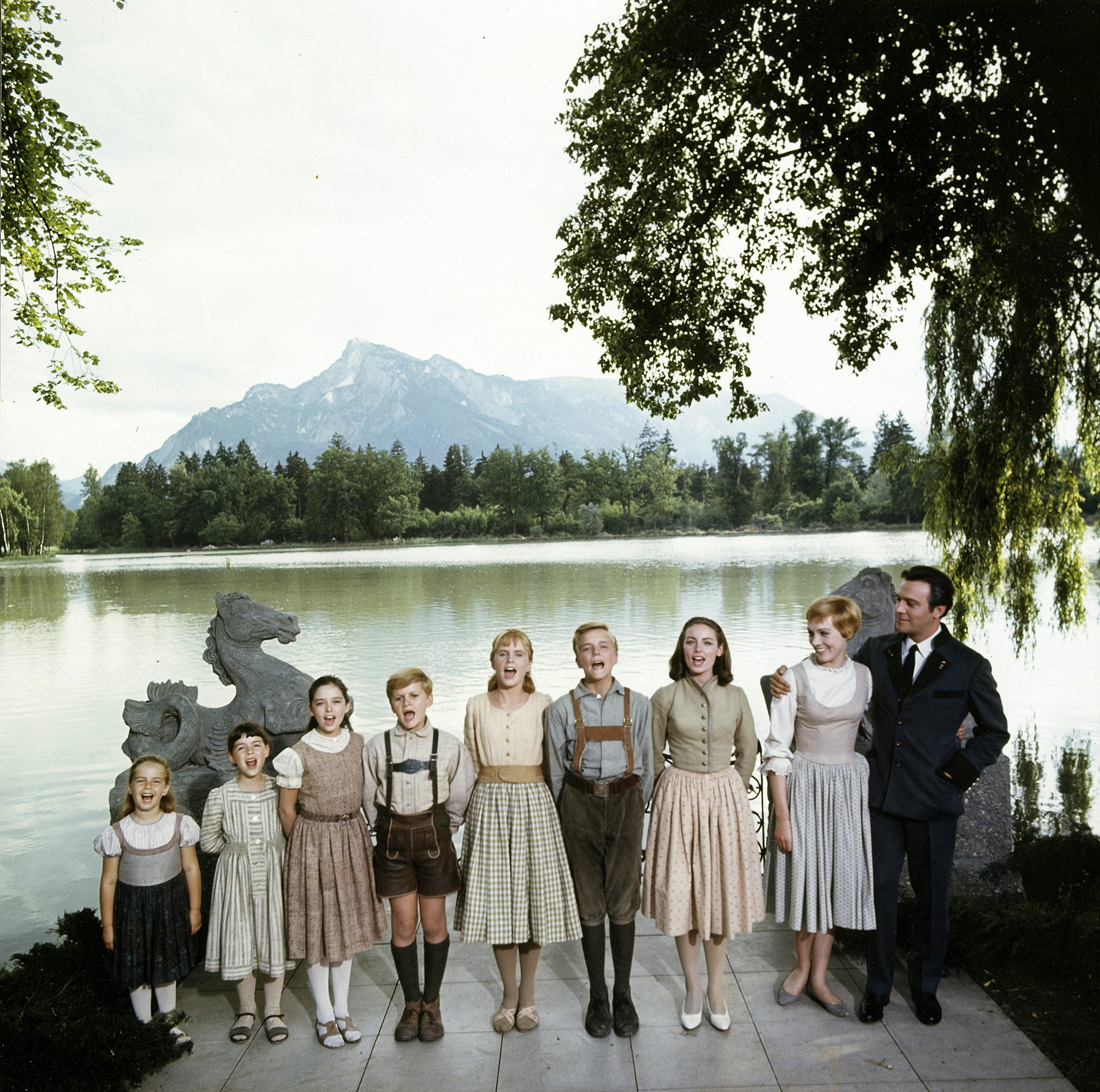 Still from the Sound of Music showing the Von Trapp family by the lake