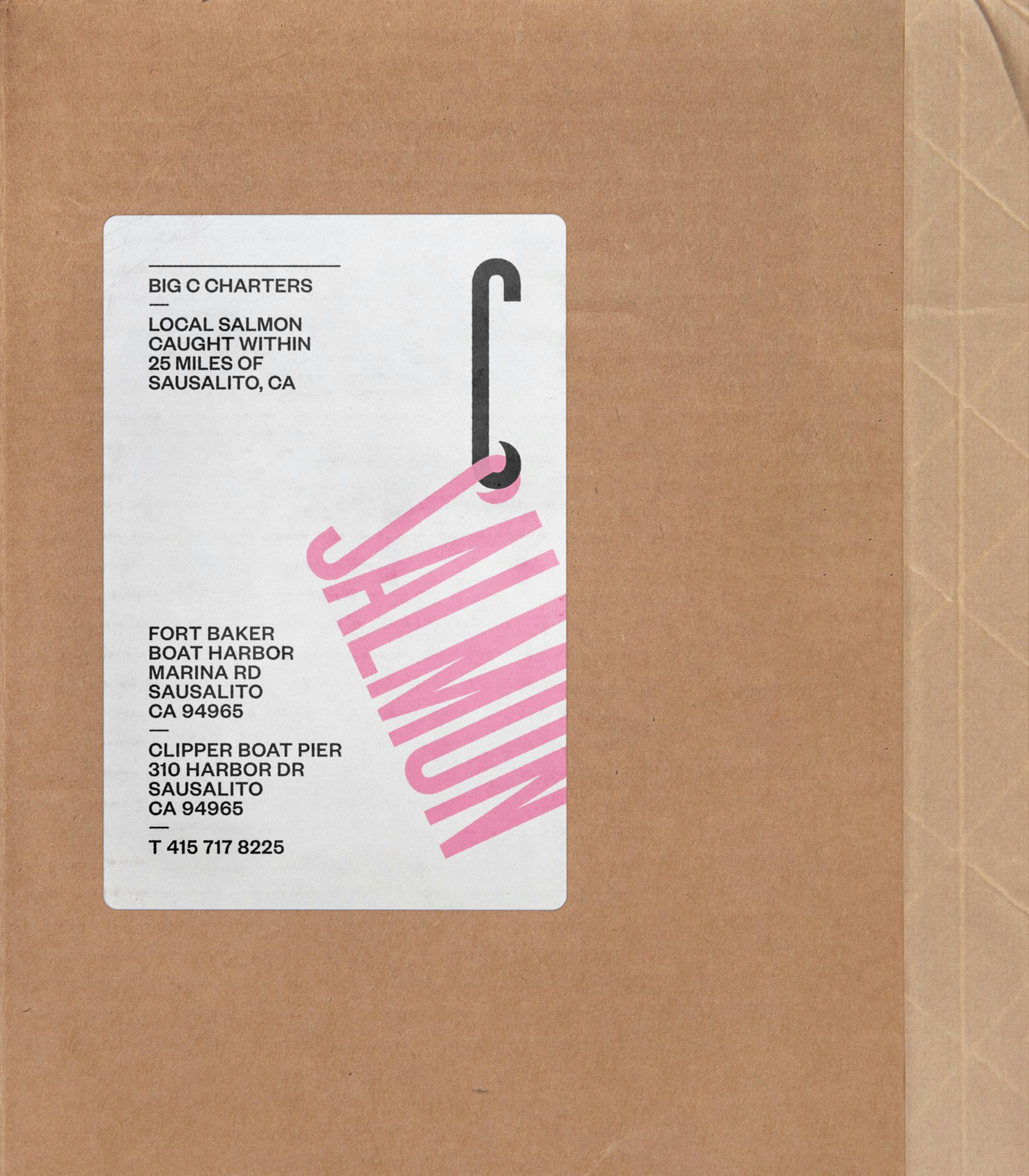 Photograph of packing label showing the Big C Charters elongated logo by Mucho