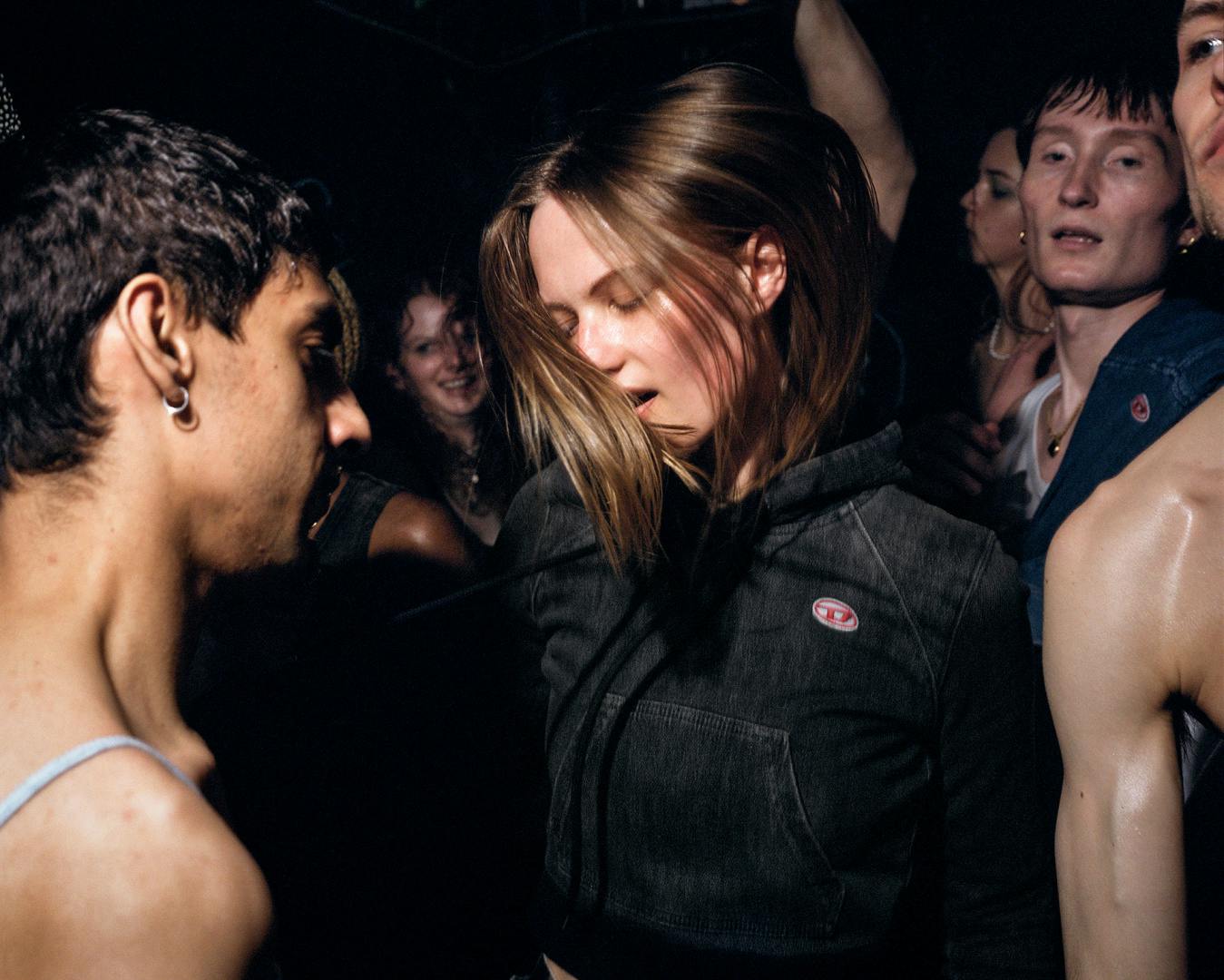 Photo of young people in a club for Diesel's Track Denim campaign by Ewen Spencer