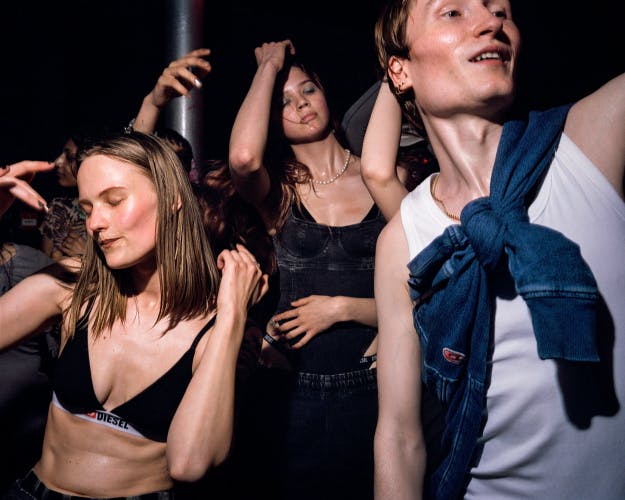 Photo of young people in a club for Diesel's Track Denim campaign by Ewen Spencer