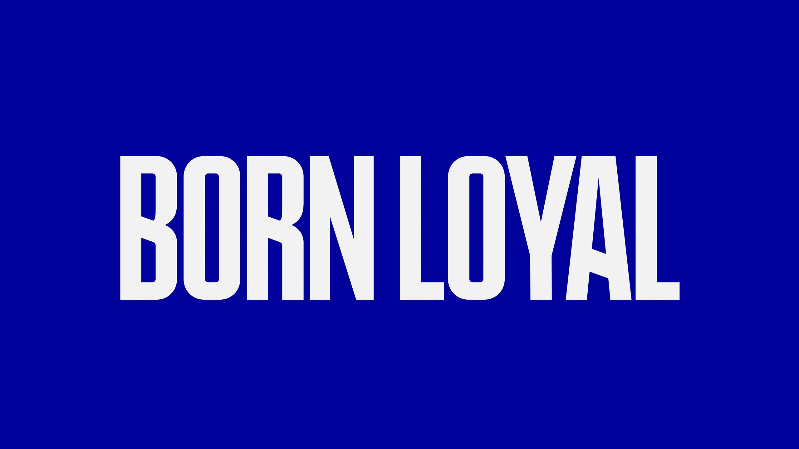 Blue graphic with white text that reads 'Born Loyal'