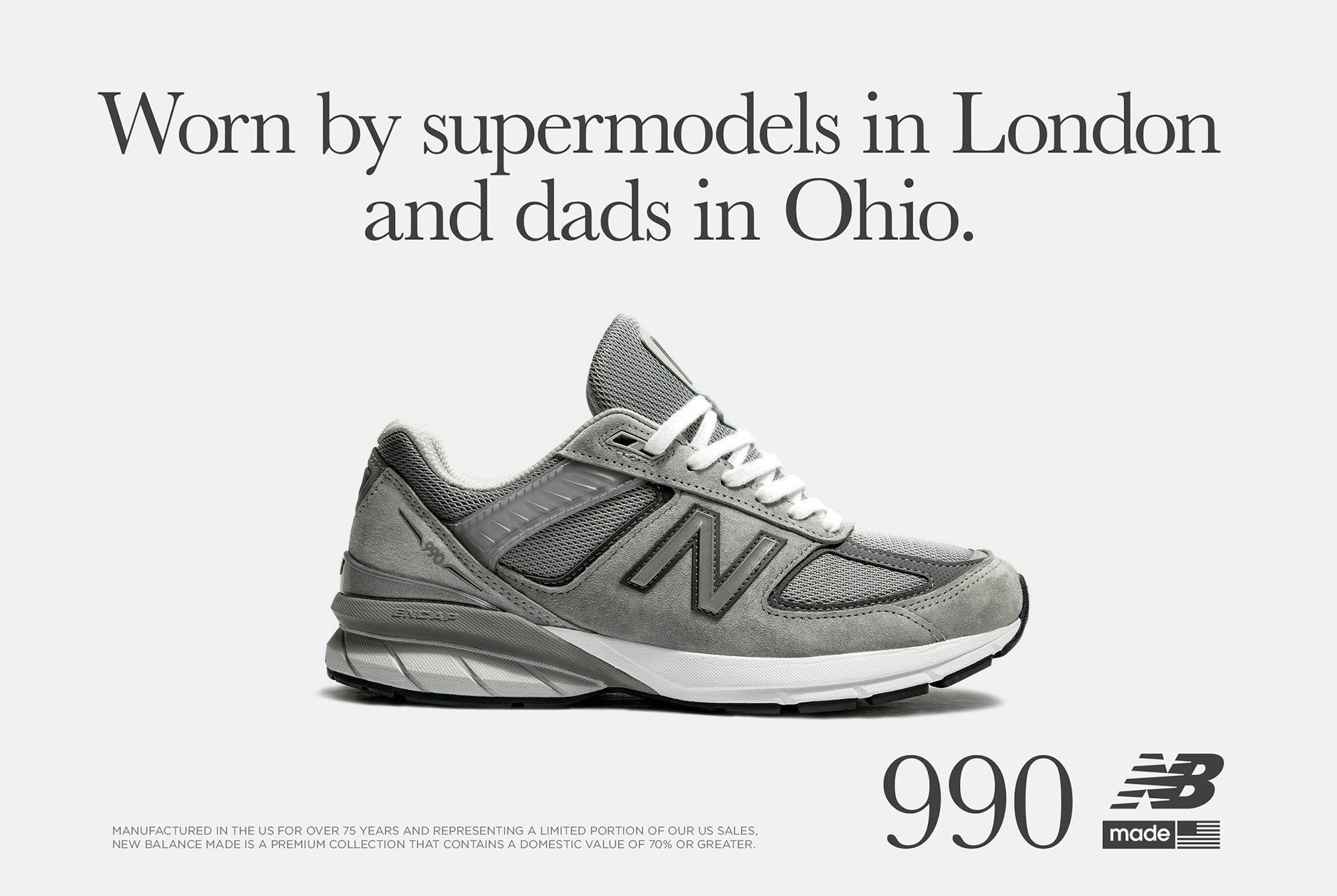 Photograph of a grey New Balance 990v5 trainer