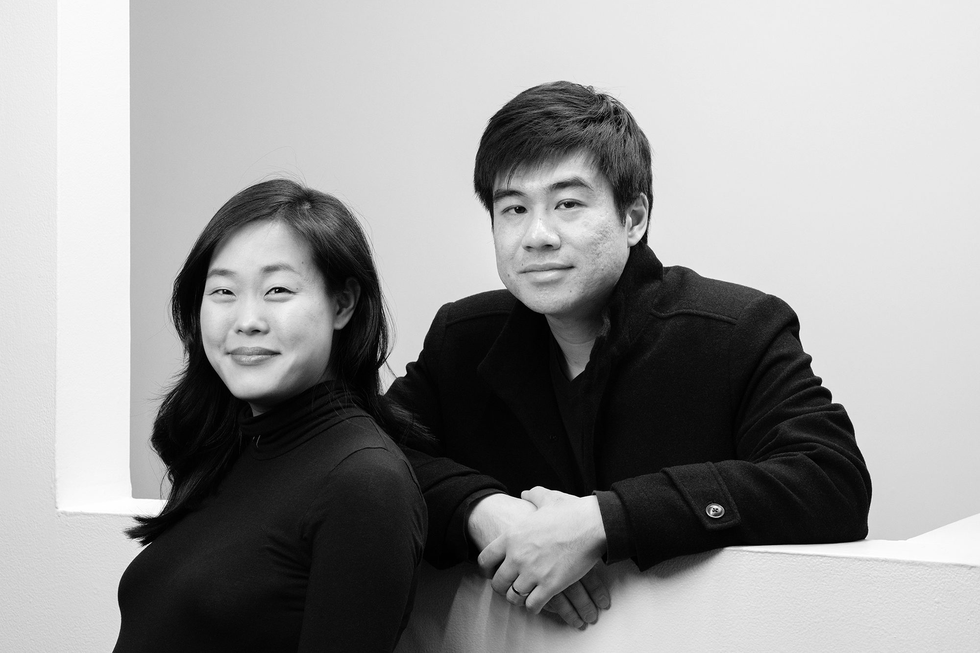 Black and white photograph of Parsons educators YuJune Park and Caspar Lam