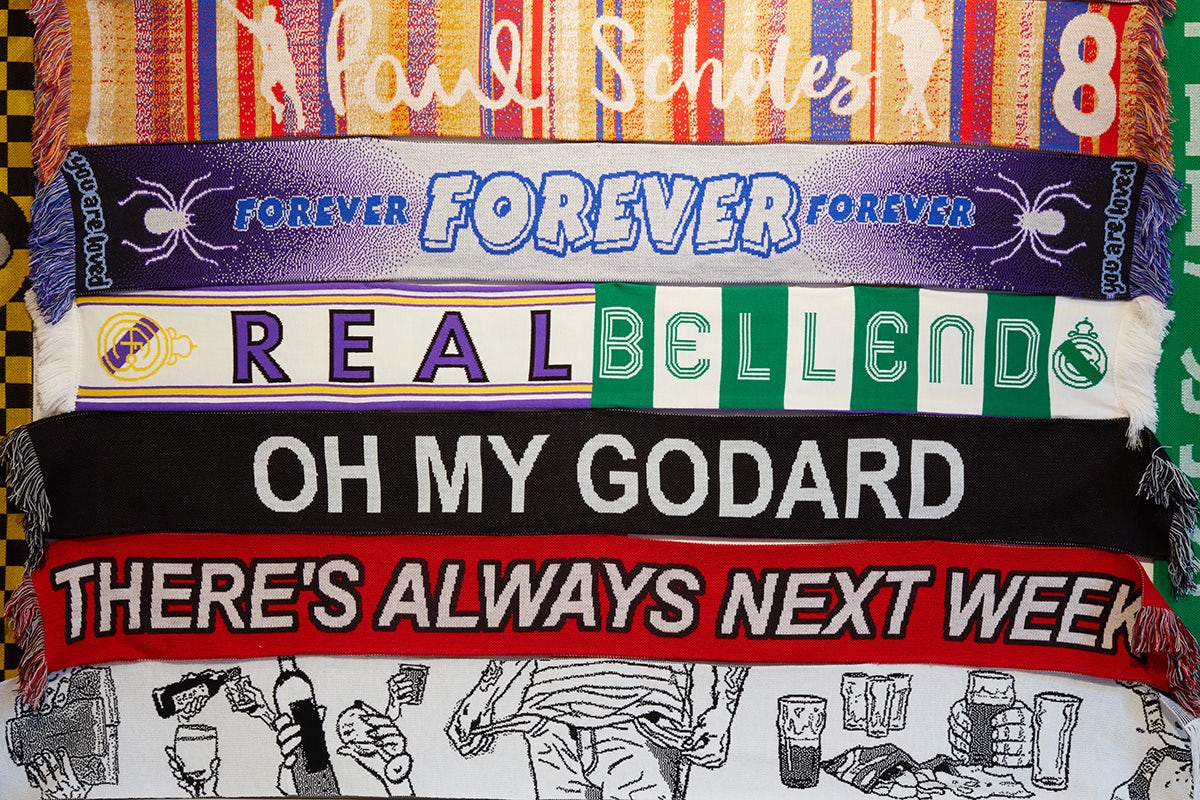 Image shows 6 of the football scarves on display at OOF Gallery