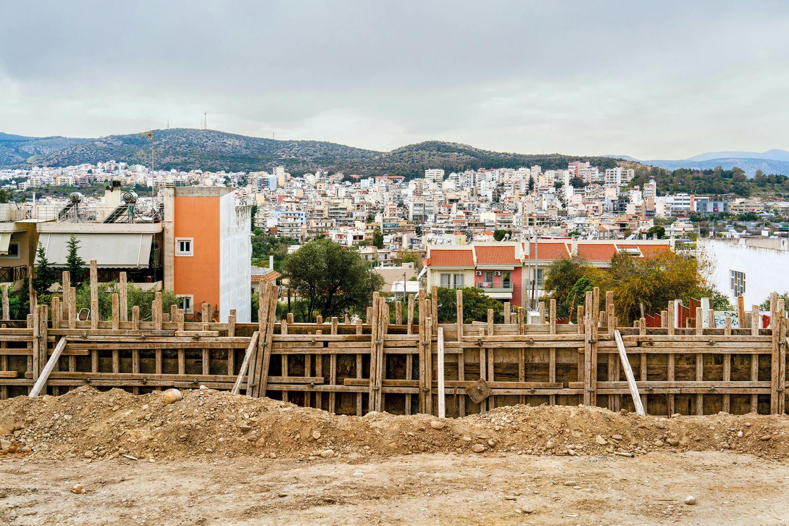 Image by Niko J. Kallianiotis showing a construction site overlooking Athens
