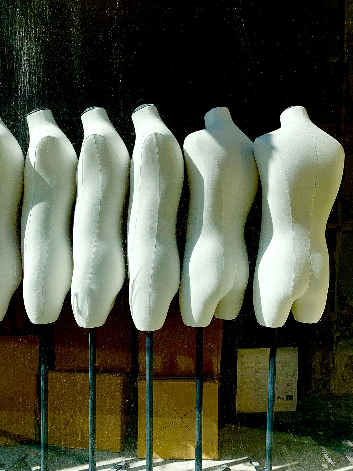 Photograph showing six bare mannequins from GSM by Axel Morin