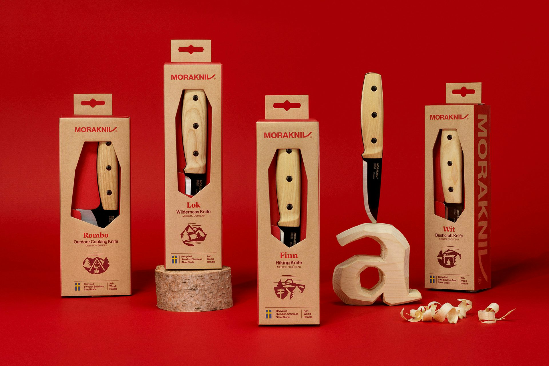 Image shows the Morakniv packaging design shown on five products, with the knife shown within a cutout on the packaging