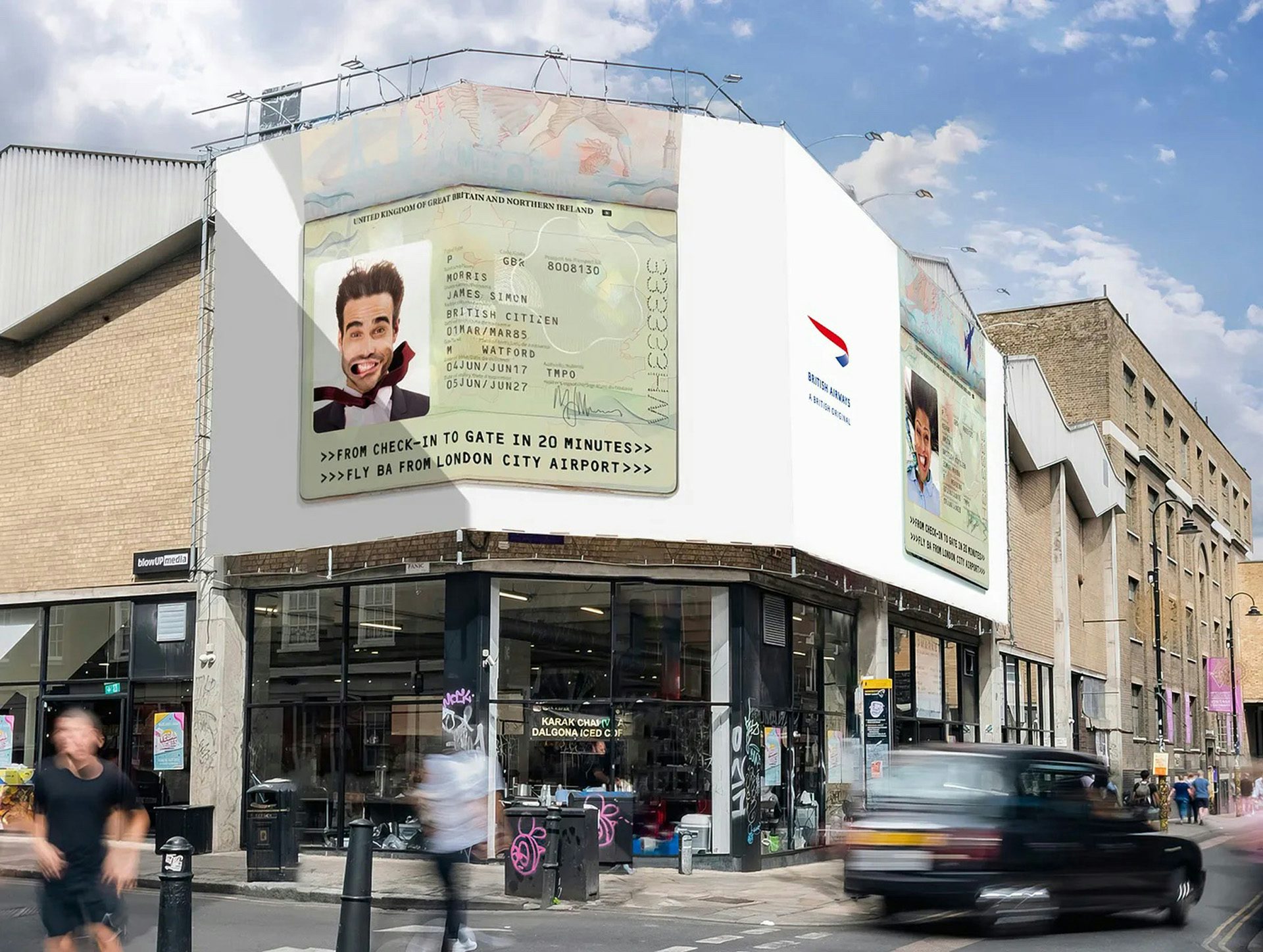 Image shows a British Airways advert on the side of a building showing an edited passport page, featuring a passport photo of a person with their mouth blown wide open