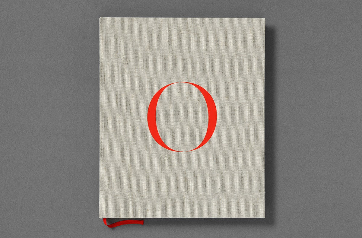 Photograph of the cover of O by Luis Alberto Rodriguez, featuring the letter O in red font against a pale grey background