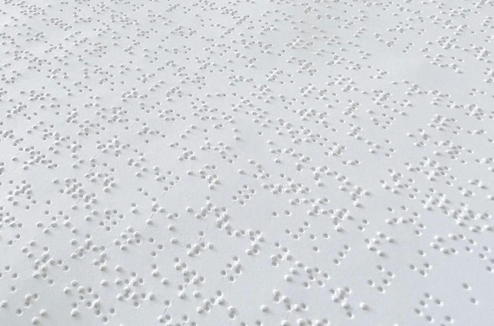 Image shows a close up of the Braille edition of British Vogue May 2023