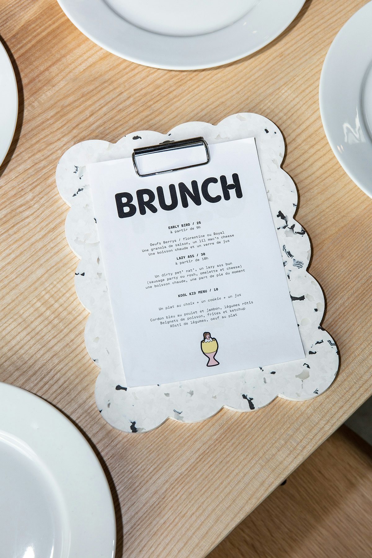 Photo of a menu with scalloped edges labelled brunch