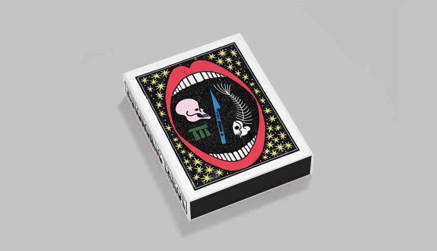 Image of the clamshell cover of Autonomic Tarot featuring a cover illustration by Sophy Hollington showing an open mouth with a skull and a fishbone inside