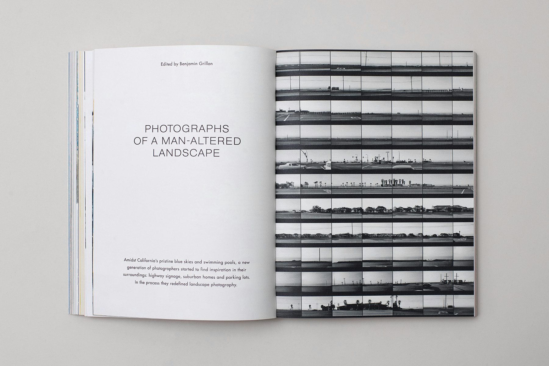 Photograph of a spread from the Blue issue of The Colour Journal, showing text on the left hand page headlined 'photographs of a man altered landscape', and a black and white contact sheet on the right hand page