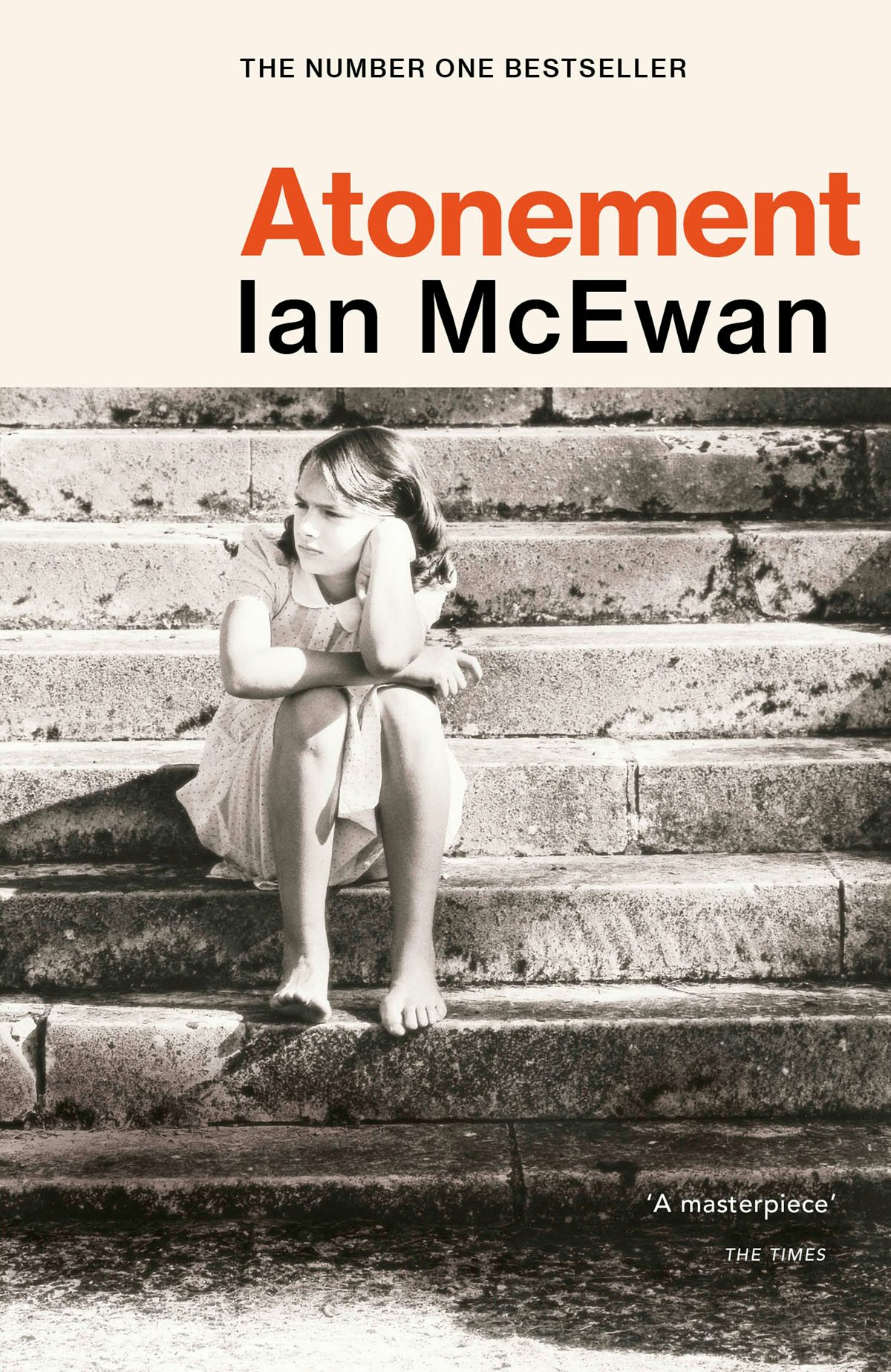 Cover of Atonement by Ian McEwan showing a black and white photograph of a young person sat on steps 
