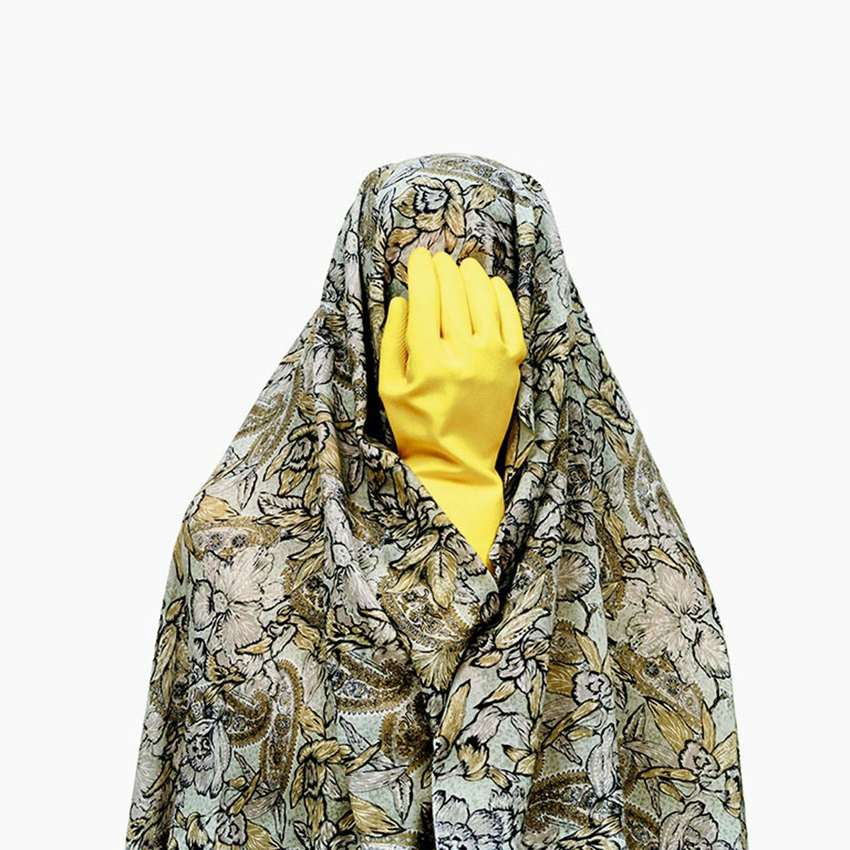 Photograph by Shadi Ghadirian showing a person wearing a floral veil, their face covered by a yellow rubber glove