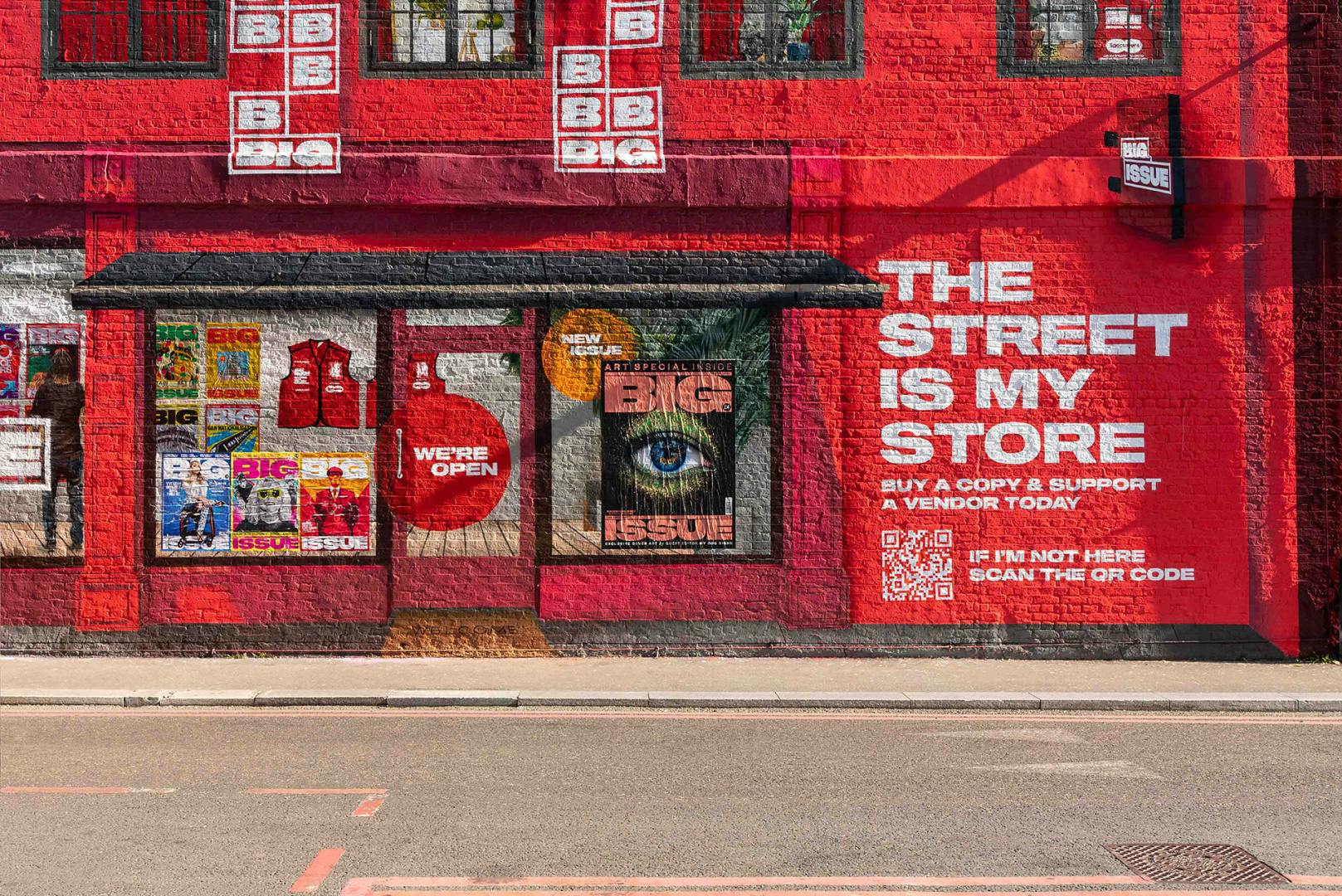 Photograph of a building wall painted to resemble a shopfront for the Big Issue, including the slogan 'The street is my store' in bold white lettering
