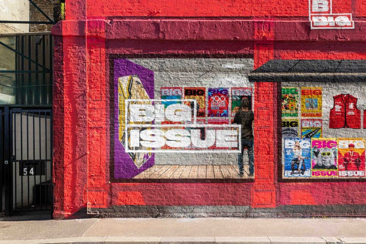 Photograph of a building wall painted to resemble a shopfront for the Big Issue