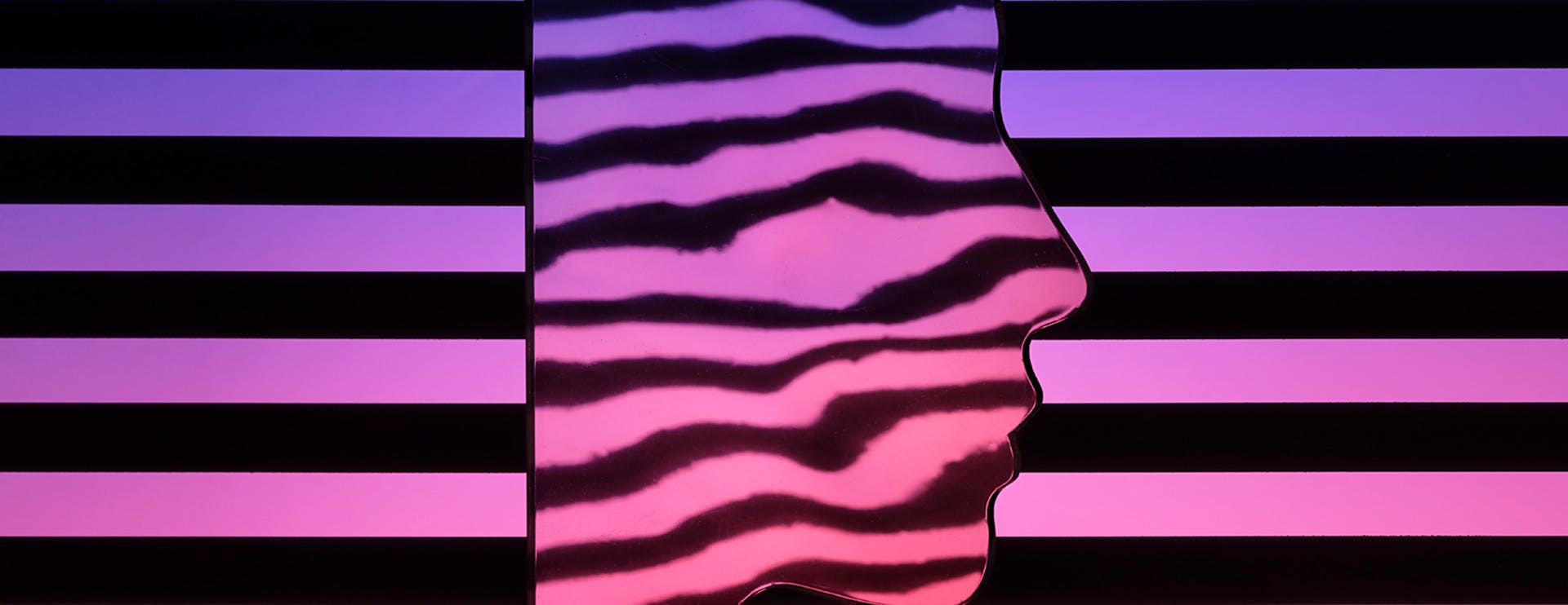 Graphic shows a black and magenta horizontal stripe design with the silhouette of a face embedded at the centre