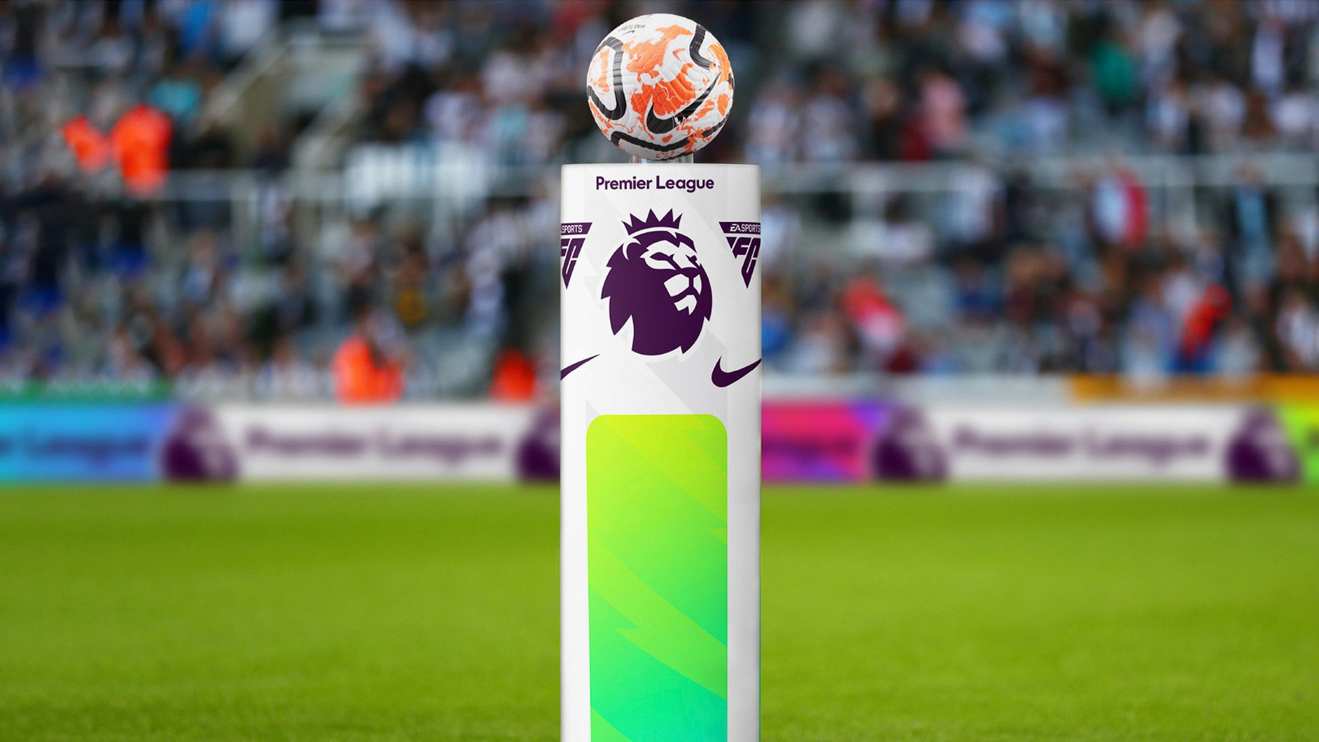 Photo from the Premier League brand refresh showing the league's purple lion icon on a podium with a white, orange and black Nike football on top