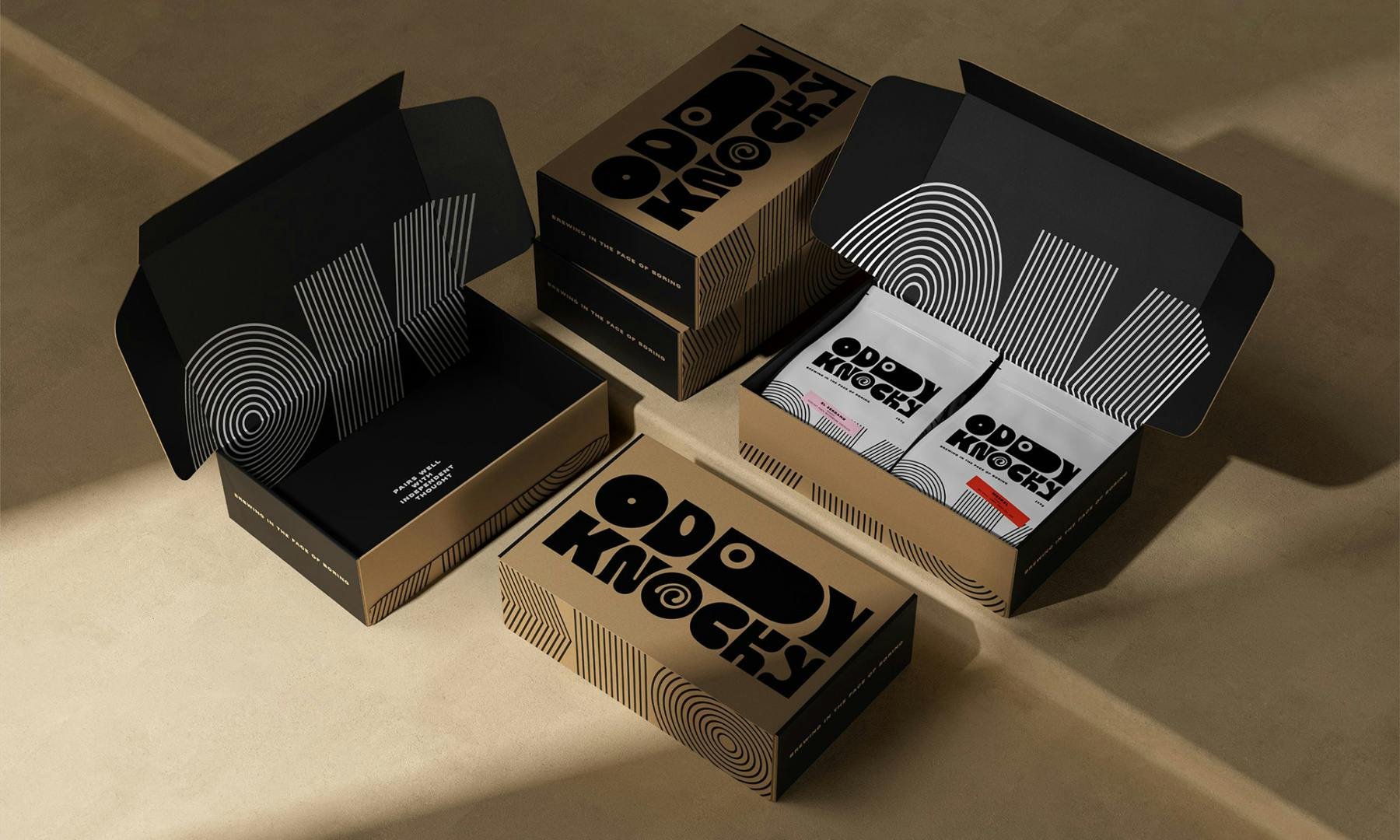 Photo showing the branding for Oddy Knocky on a range of cardboard packaging, featuring the brand's quirky elongated wordmark