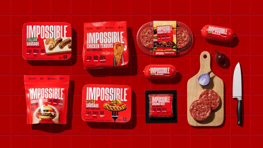 Image shows the Impossible product line up featuring its new red branding and packaging design