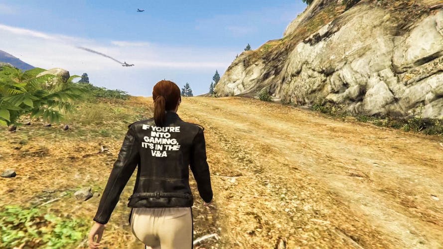 Image showing the V&A campaign slogan 'if you're into it, it's in the V&A' written on the back of a jacket worn by an avatar in Grand Theft Auto Online