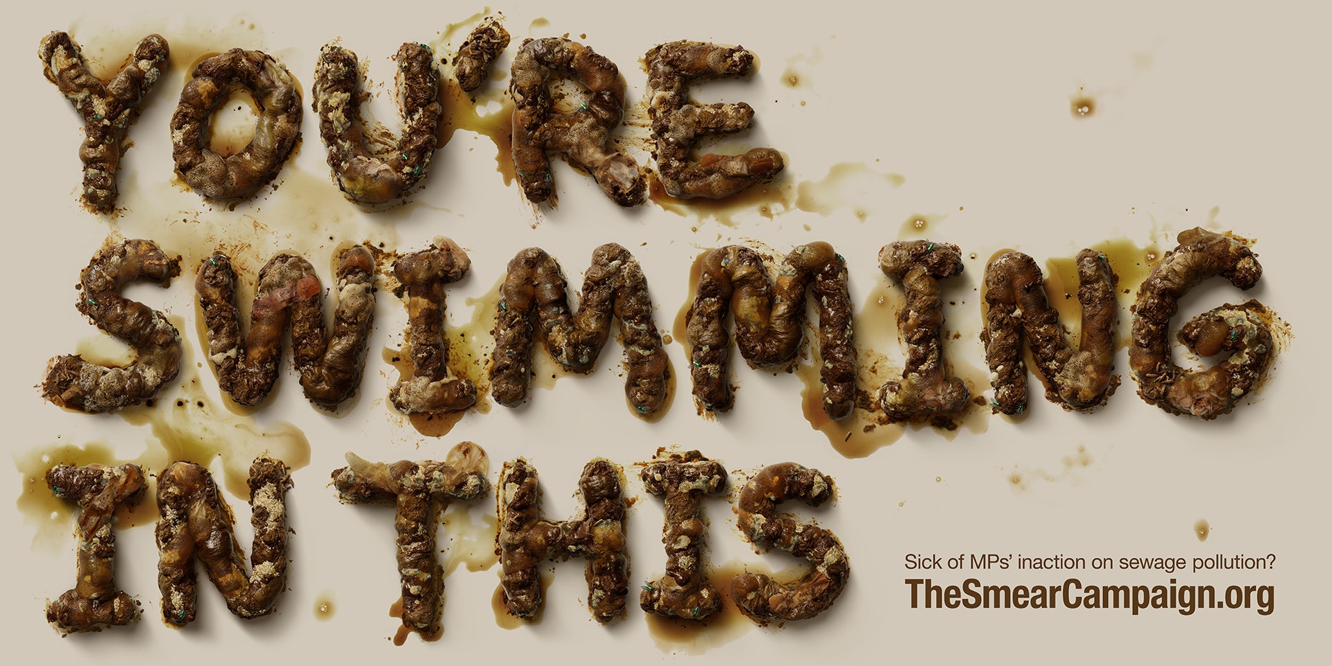 Poster that reads 'You're swimming in this' in a font that's been designed to resemble sewage
