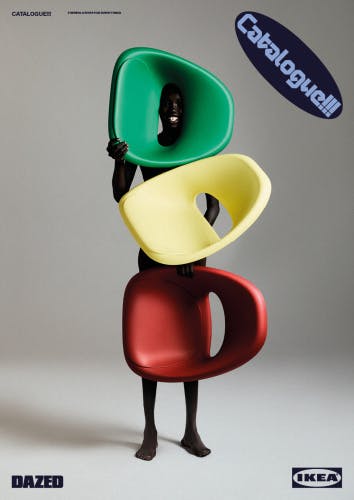 Studio photograph from Dazed and Ikea's zine showing a person whose body is covered in a sculpture made out of three plastic seats in green, yellow, and red