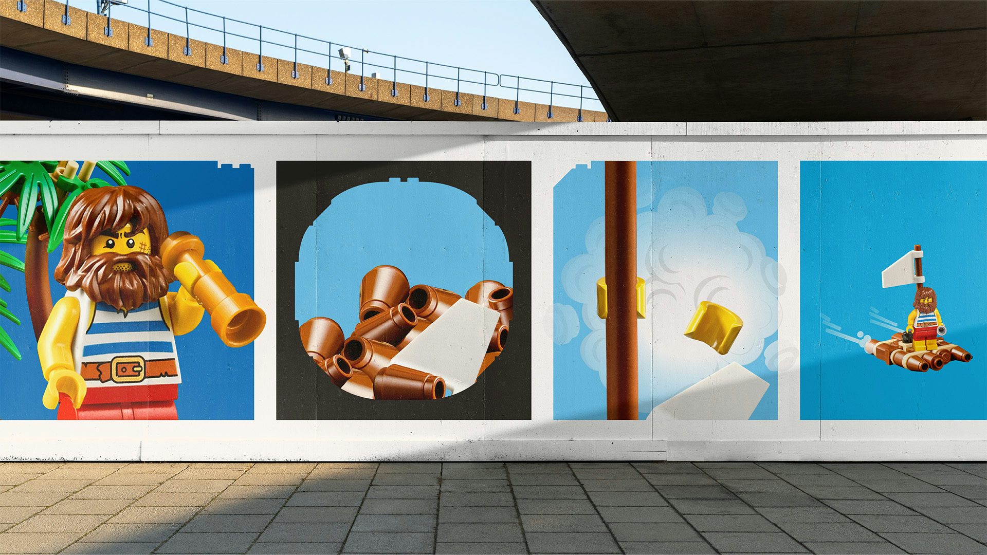 Image shows a row of four outdoor adverts showing Lego's new design system