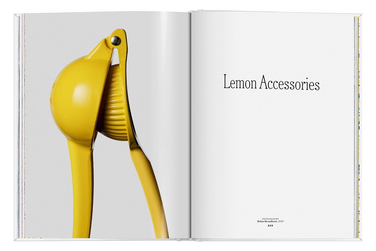 Image shows a spread from The Gourmand's book, Lemon, showing an image of a yellow lemon squeezer on the left page, and the headline 'Lemon accessories' on the opposite page
