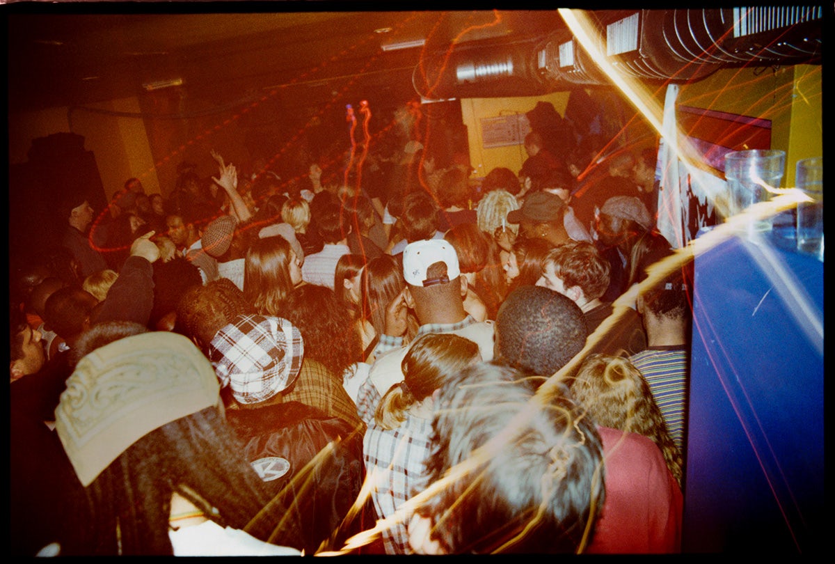 Motion blurred photo of people in a club