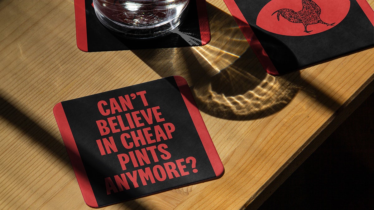 KFC branded beer mats featuring the line 'can't believe in cheap pints anymore?'