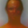 Blurred image of a person's mugshot against a grey backdrop by Paolo Cirio