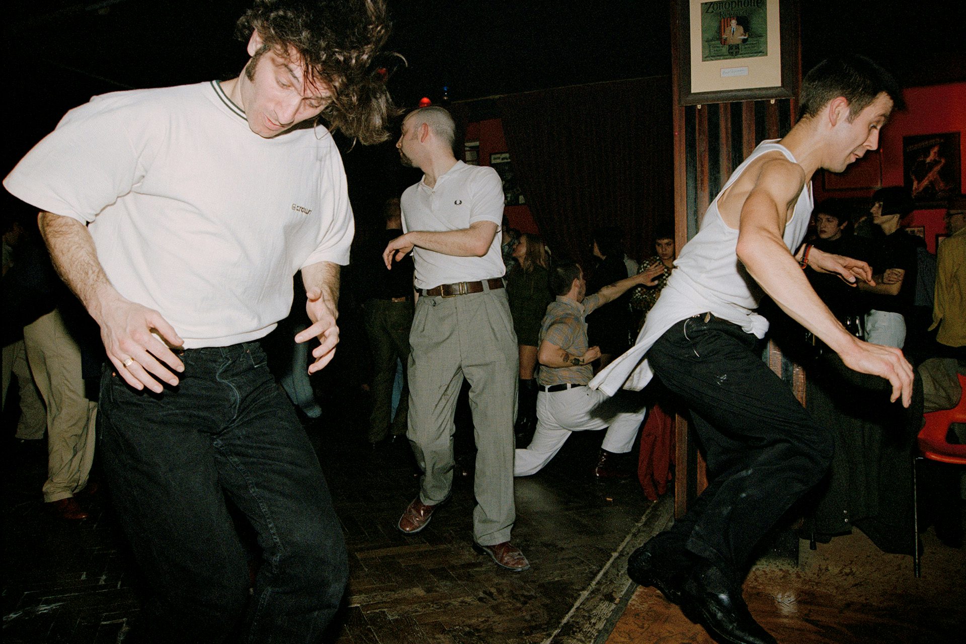 A group of people dancing exuberantly