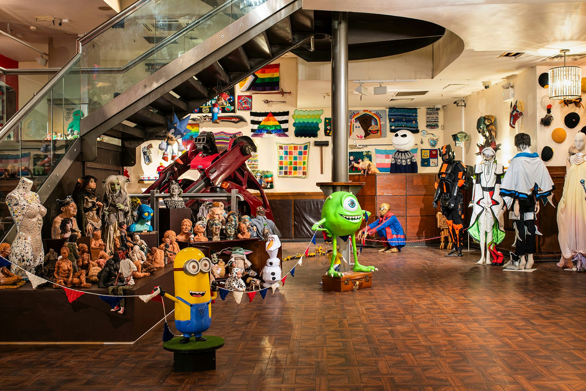 Exhibition installation of film and TV characters including Mike Wazowski from Monsters Inc and a Minion