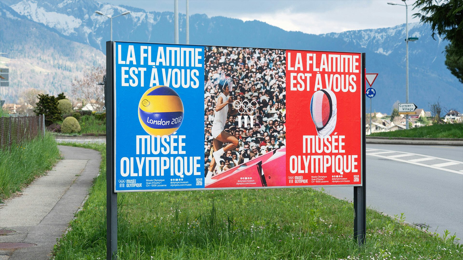 Olympic Museum promotional poster featuring its new visual identity, and the phrase 'la flamme est a vous'. In the background of the photo is a snowy mountaineous scene