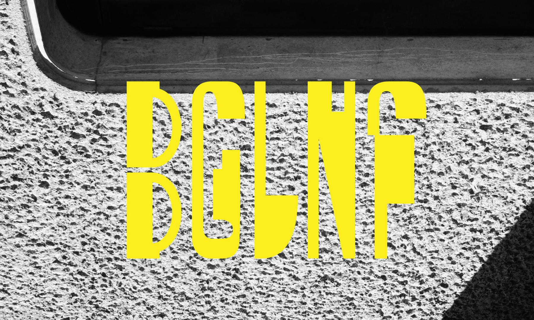 Wordmark that reads 'BGLNF' laid out in yellow tall angular letters, shown against a grey pebbledash background