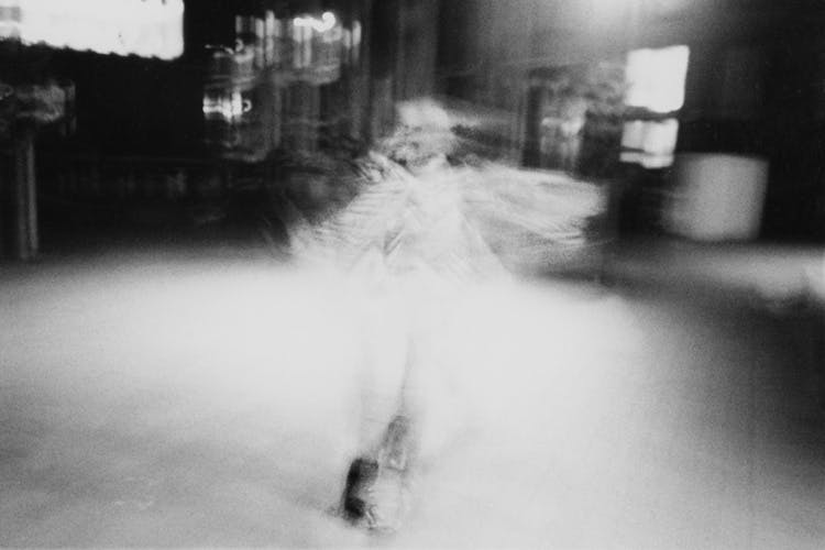 Blurred abstract black and white photo of a dancer