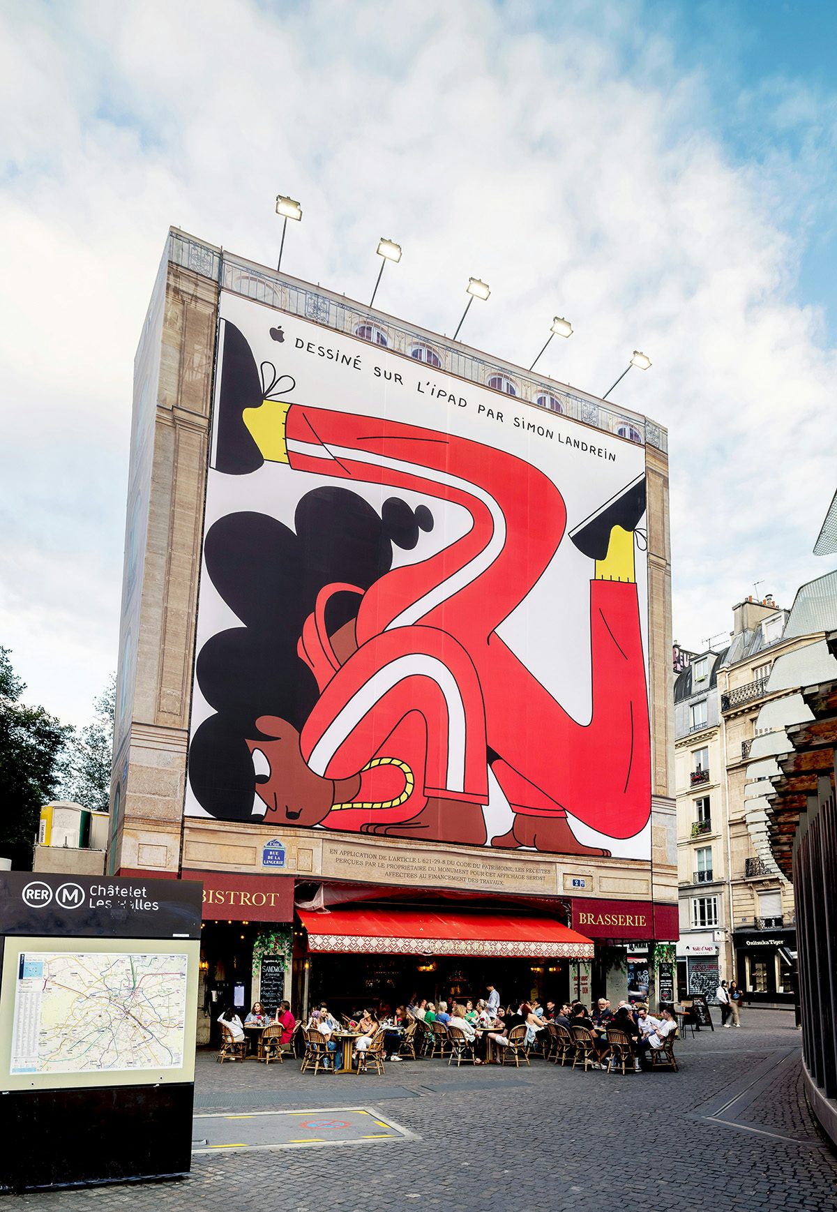 Illustrated poster by Simon Landrein showing a character breakdancing shown on the side of a building