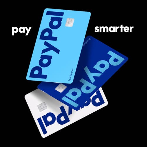 Three PayPal debit cards in different shades of white and blue and featuring its new branding