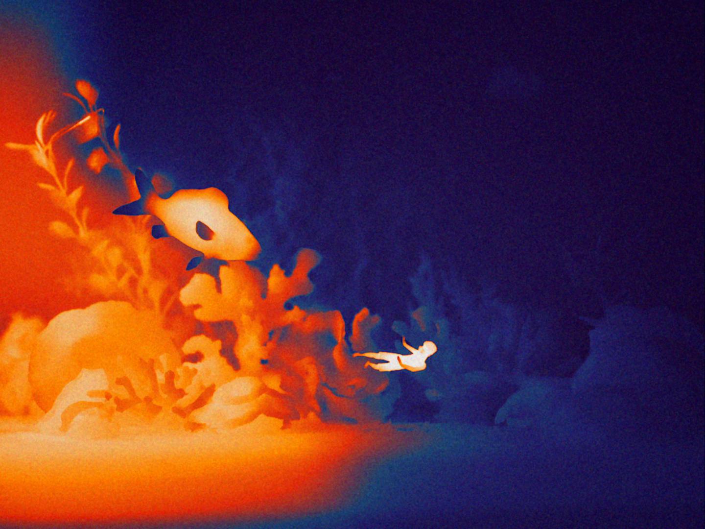 Still from WWF film shot using a thermal camera showing an underwater scene showing swimming along the seabed with glowing orange fish around them against a deep blue backdrop