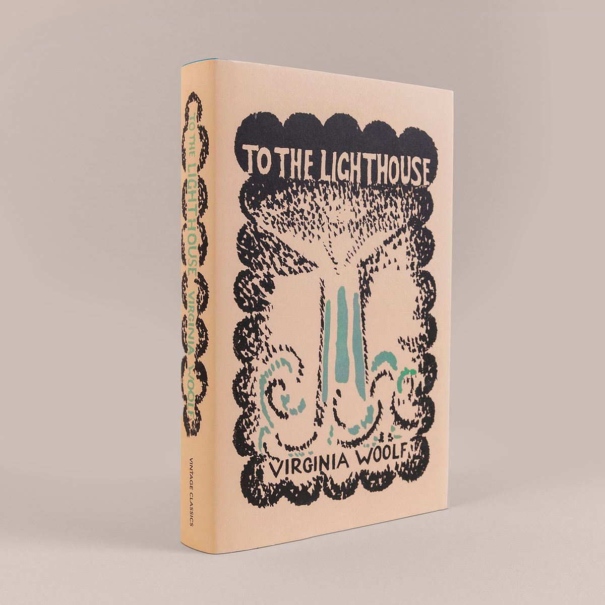 Cover of the Vintage Classics centenary edition of To The Lighthouse by Virginia Woolf featuring an black and blue woodcut design of a lighthouse in the sea by Vanessa Bell