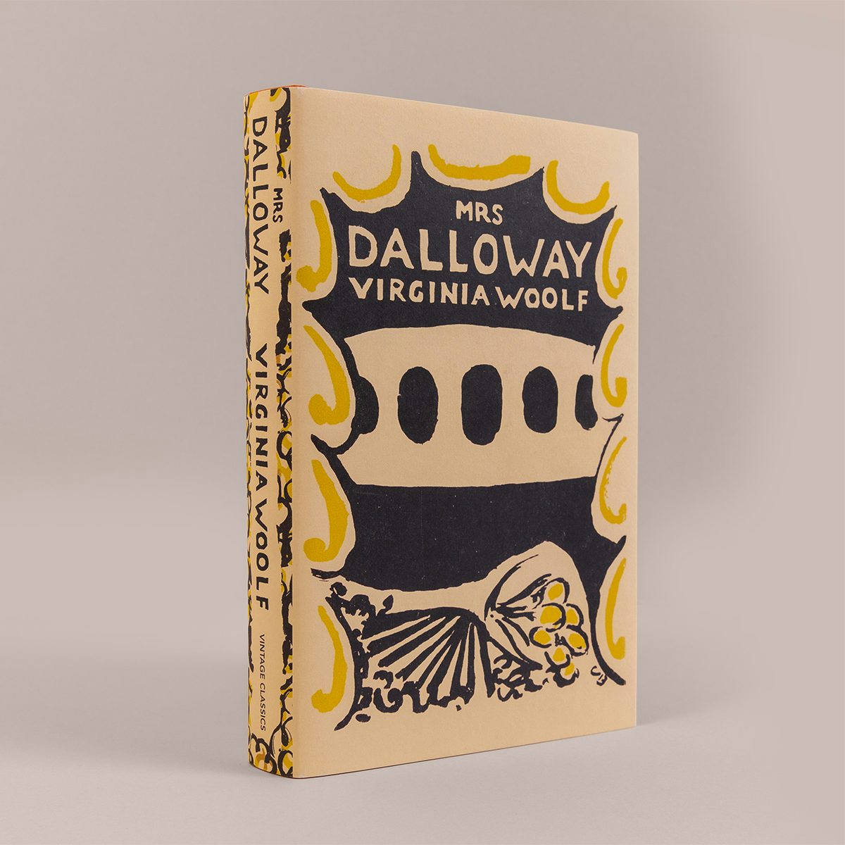 Cover of the Vintage Classics centenary edition of Mrs Dalloway by Virginia Woolf featuring a black and yellow woodcut design by Vanessa Bell