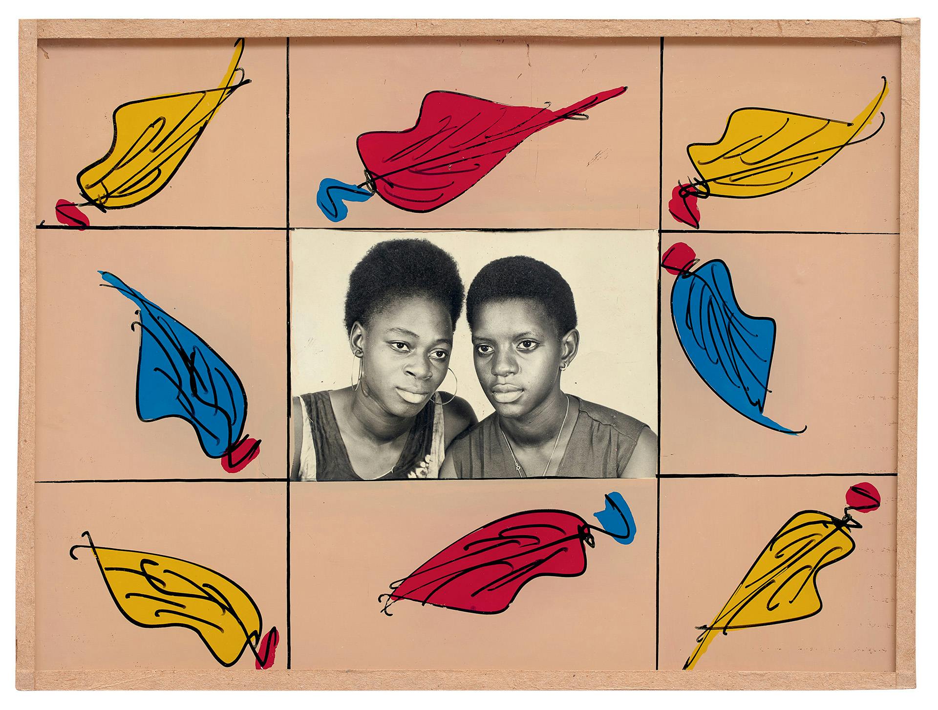 Black and white portrait of two people posing a studio, which is bordered by a taupe painted frame with red, blue and yellow leaves each displayed in a grid design