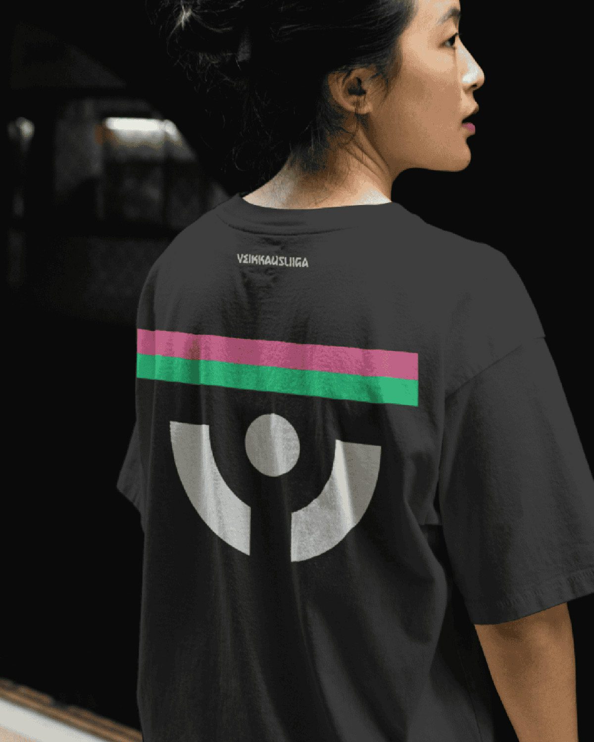 T-shirt featuring the Veikkausliiga logo of a colourful line with a semi circle underneath